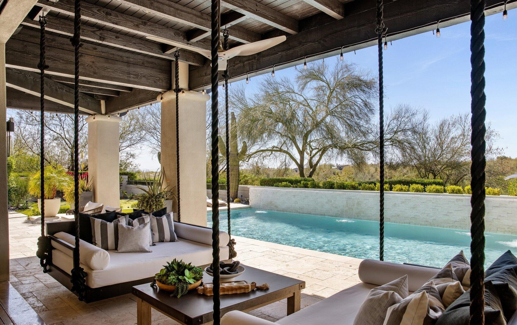Covered patio and outdoor living with desert and mountain views